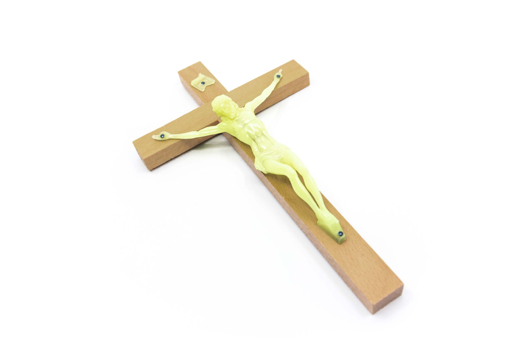 Wandkreuz mit fluoreszierendem Korpus
