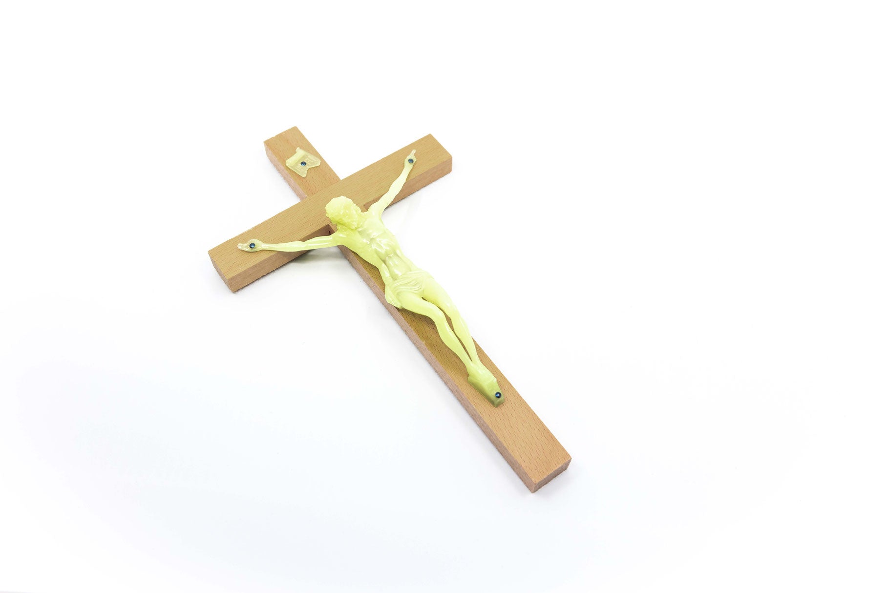 Wandkreuz mit fluoreszierendem Korpus – Detailansicht